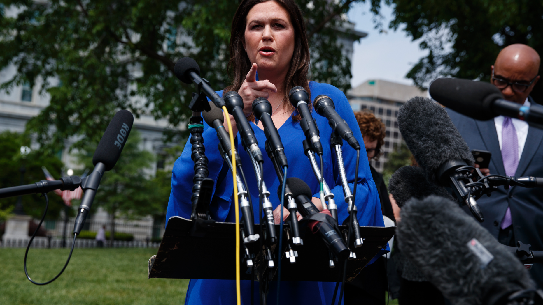 White House press secretary Sarah Sanders speaks with reporters outside the White House, Friday, May 3, 2019, in Washington. (AP Photo/Evan Vucci)