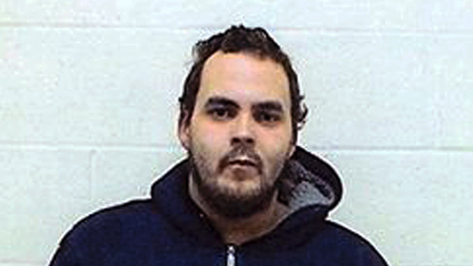 This undated booking photo posted on a search poster by the Torrington, Connecticut Police Department, on his Facebook page, shows Jose Simms, a fugitive who seeks seven arrest warrants after failing to appear in court . A ministry official reached an agreement with the fugitive on Wednesday, May 22, 2019, who agreed to surrender when there were 15,000 wanted posters on social media. (Torrington Police Department via AP)
