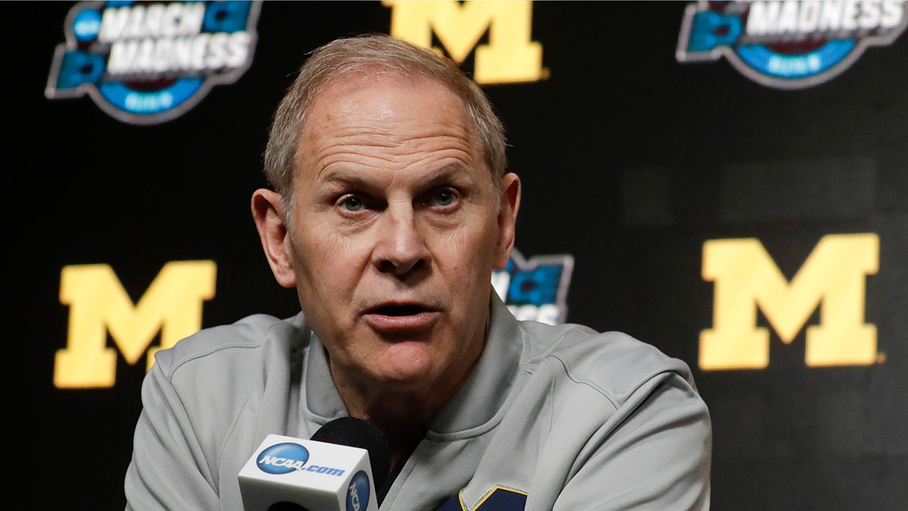 FILE - In this March 27, 2019 file photo Michigan head coach John Beilein speaks during a news conference at the NCAA college basketball tournament in Anaheim, Calif. (AP Photo/Chris Carlson, file)