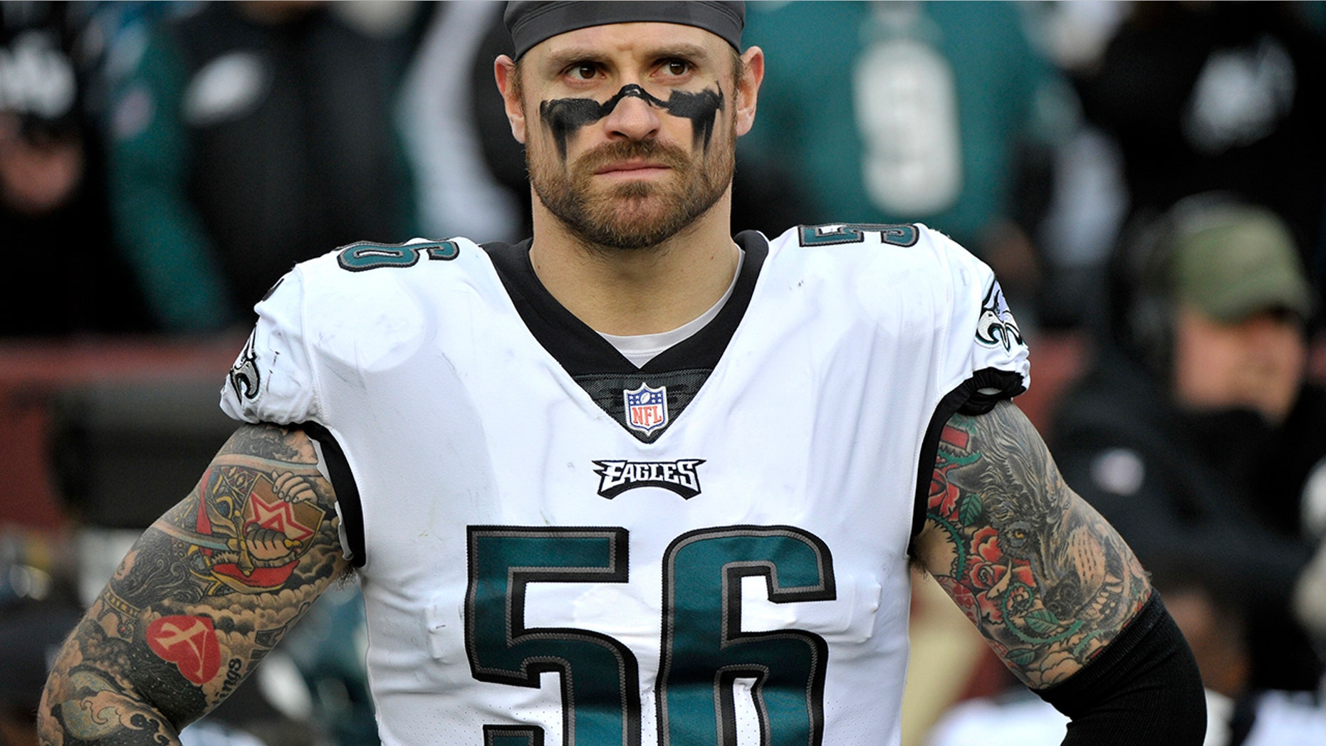 FILE - In this Dec. 30, 2018, file photo, Philadelphia Eagles defensive end Chris Long stands on the sideline prior to the team's NFL football game against the Washington Redskins in Landover, Md. (AP Photo/Mark Tenally, File)