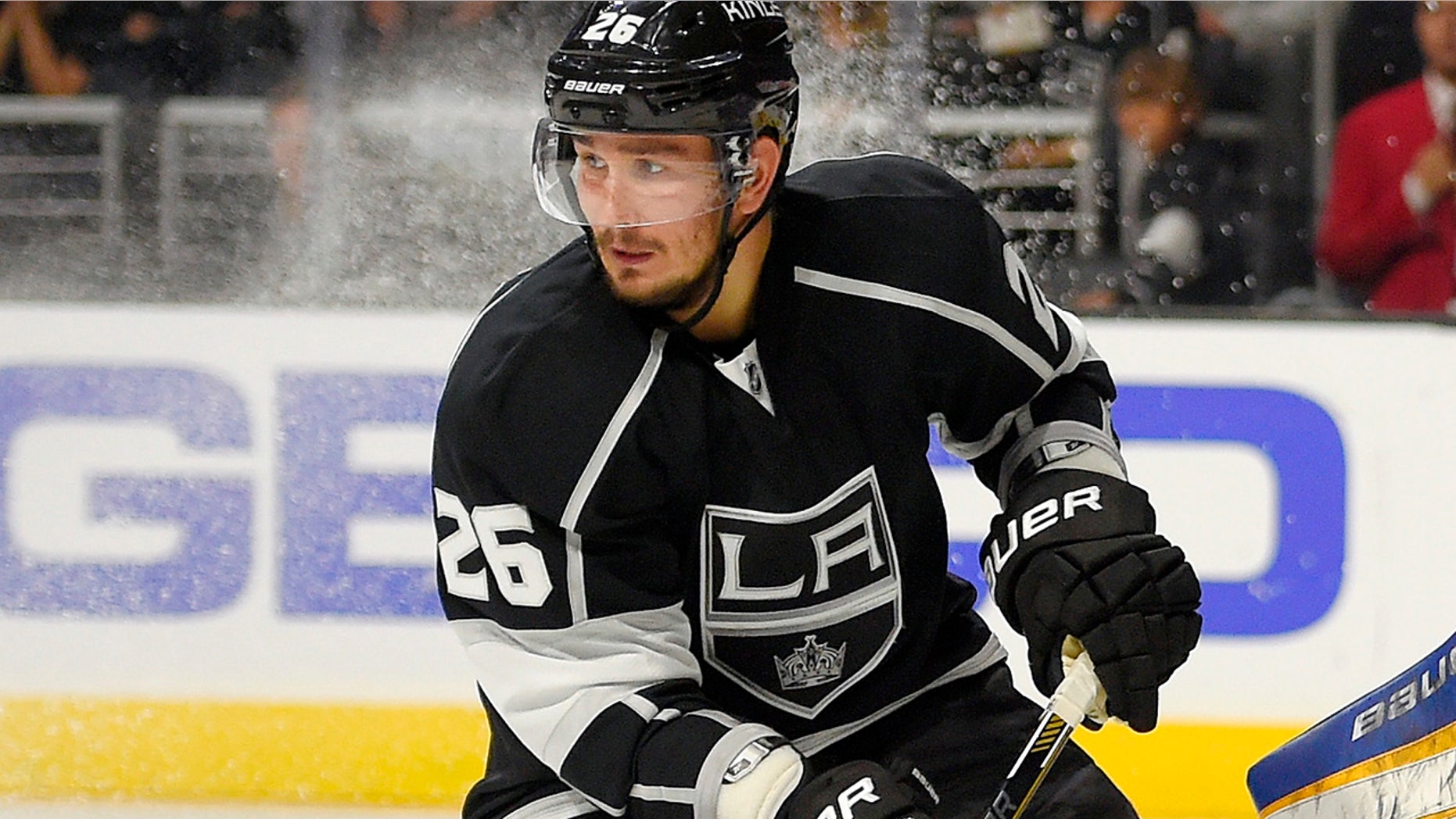 FILE - In this Oct. 16, 2014, file photo, Los Angeles Kings defenseman Slava Voynov, of Russia, skates during the third period of an NHL hockey game against the St. Louis Blues in Los Angeles. (AP Photo/Mark J. Terrill, File)