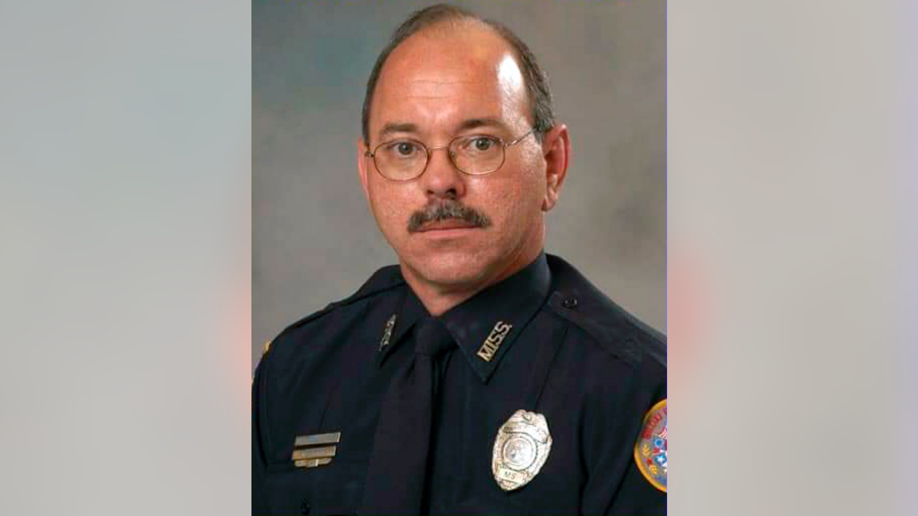 CORRECTS FIRST NAME TO ROBERT, NOT JOHN - This photo provided by the City of Biloxi, Miss., Public Affairs Department shows police officer Robert McKeithen who was killed Sunday night, May, 5, outside the department building in Biloxi. (City of Biloxi, Miss., Public Affairs via AP)