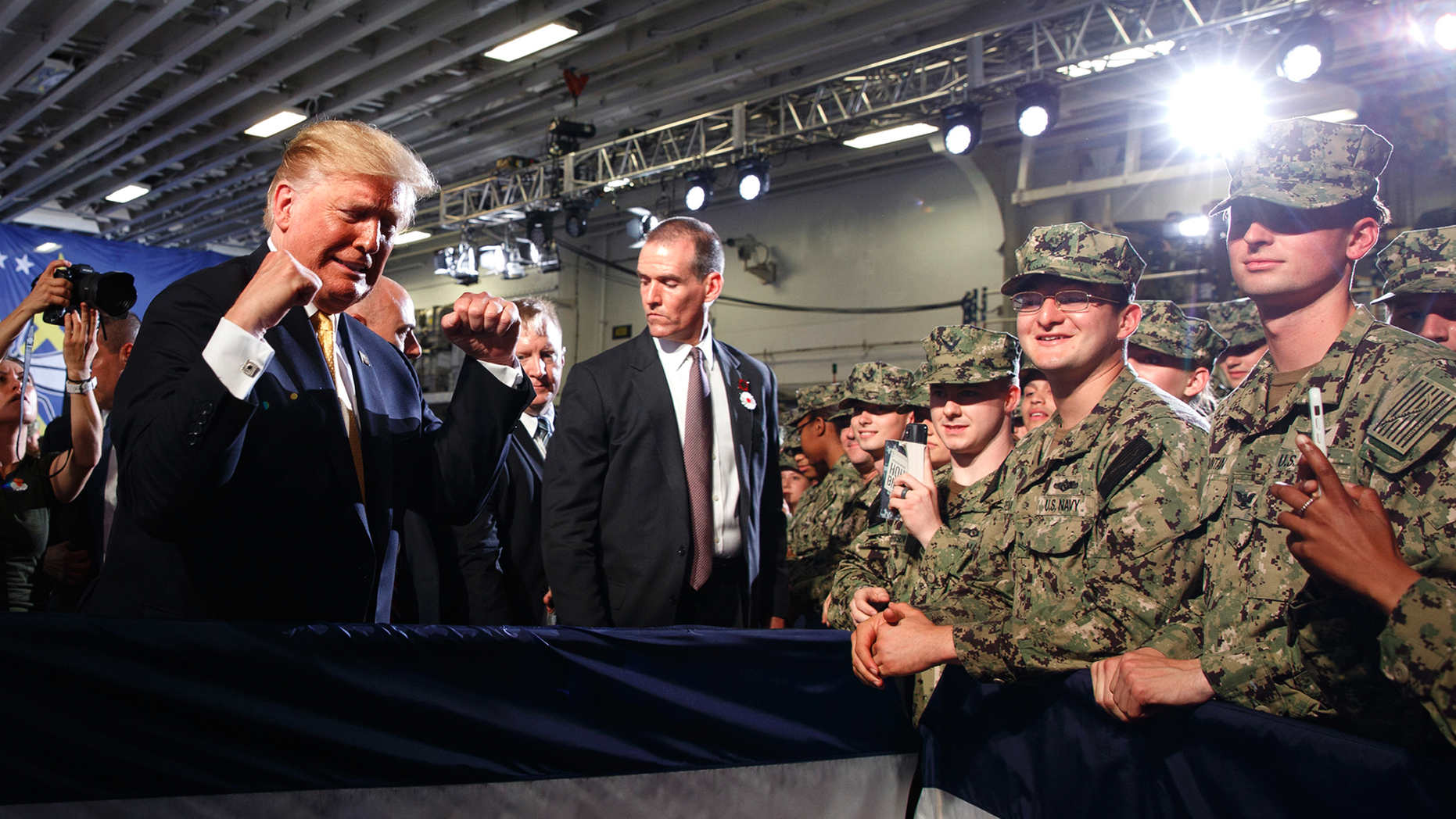 President Donald Trump greets troops after speaking at a Memorial Day event aboard the USS Wasp, Tuesday, May 28, 2019, in Yokosuka, Japan. (AP Photo/Evan Vucci)