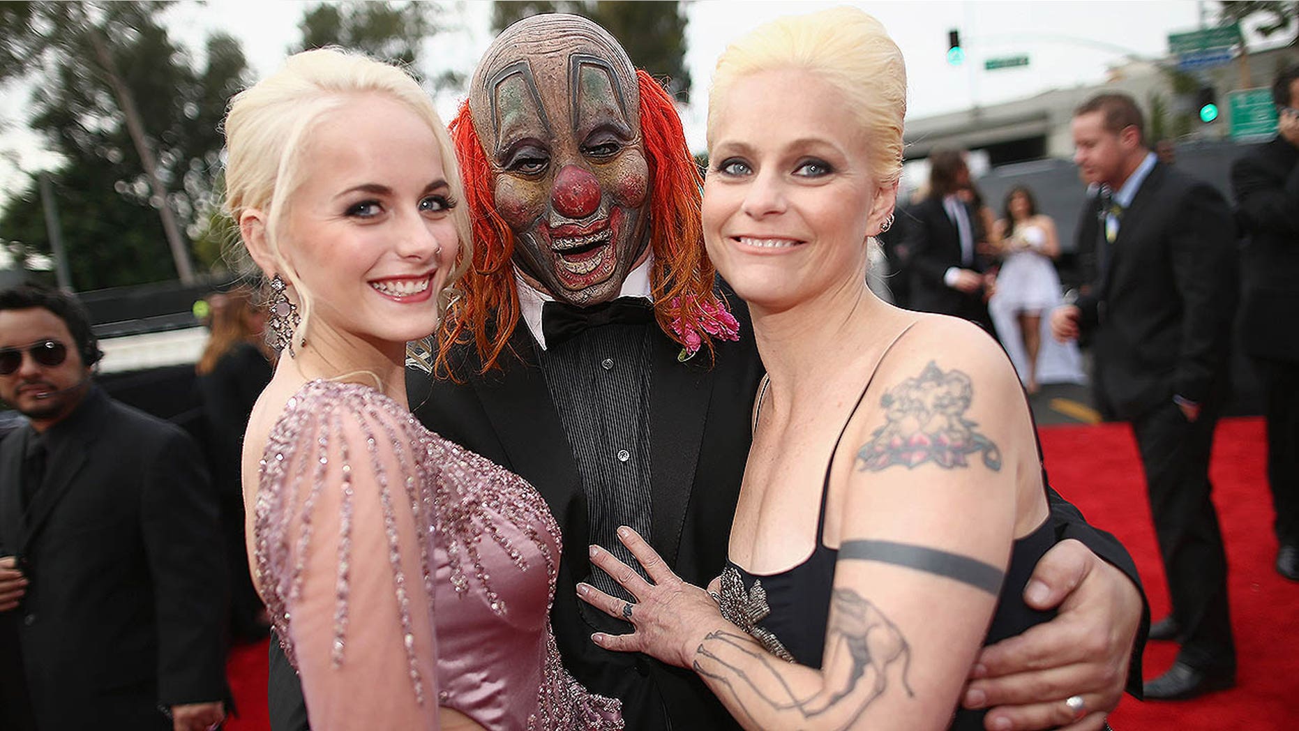 Musician Shawn "Clown" Crahan attends the Grammys with daughter Gabrielle and wife Chantel Crahan on Jan. 26, 2014, in Los Angeles. Gabrielle passed away this week at 22.