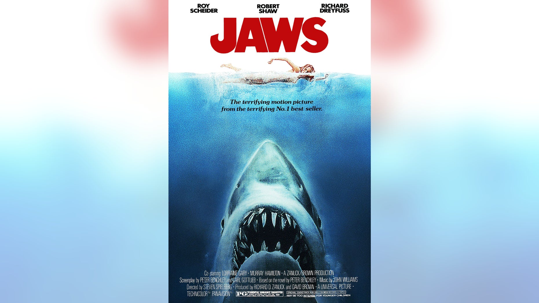 The famous movie poster for 'Jaws' is seen above.