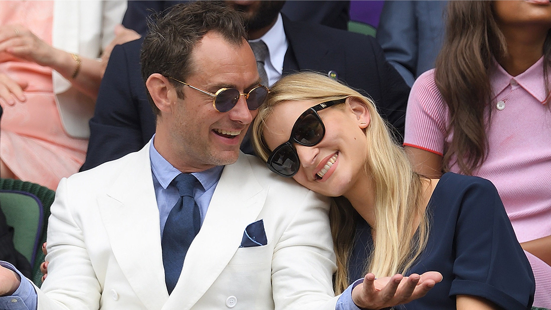 Jude Law and Phillipa Coan attend day eleven of the Wimbledon Tennis Championships at Wimbledon on July 08, 2016 in London, England.