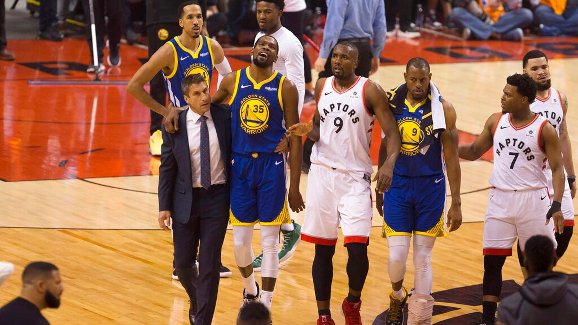 Golden State Warriors forward Kevin Durant (35) walks off the court after sustaining an injury.
