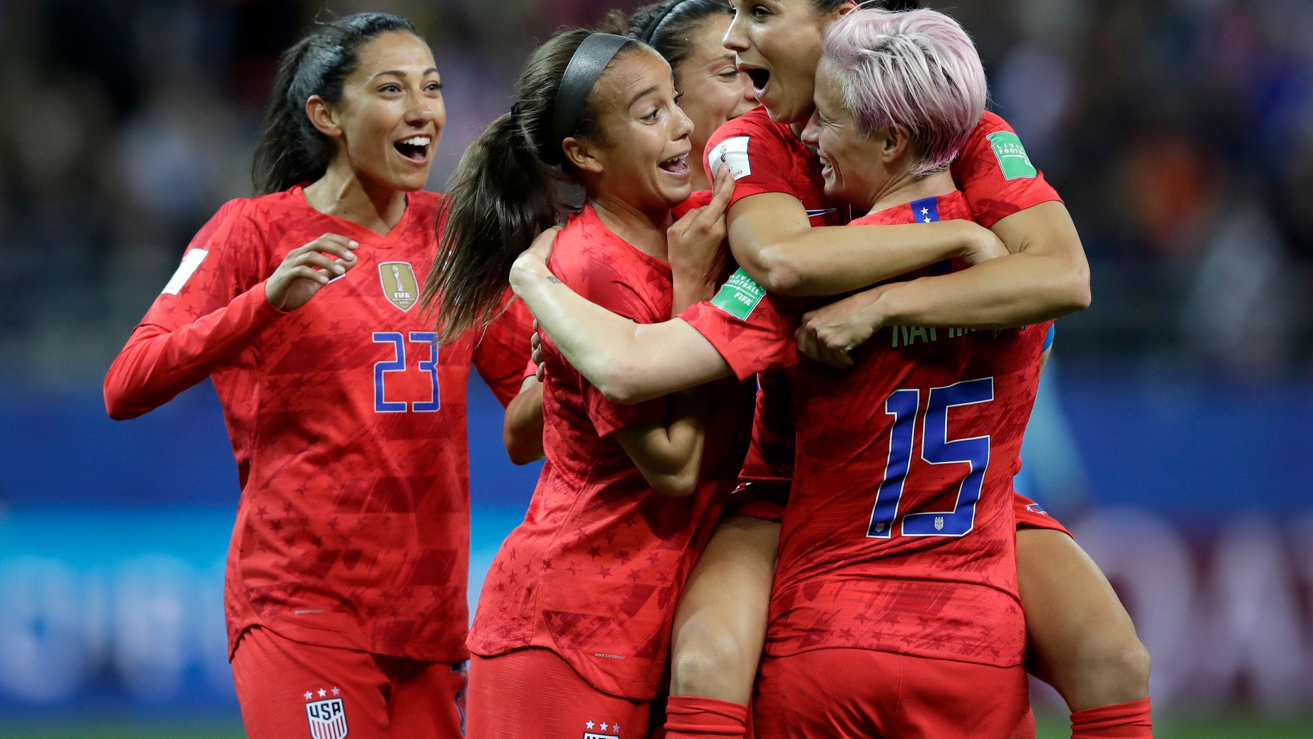 United States' Alex Morgan, second right, celebrates after scoring her side's 12th goal during the Women's World Cup Group F soccer match between United States and Thailand at the Stade Auguste-Delaune in Reims, France, Tuesday, June 11, 2019. Morgan scored five goals during the match. (AP Photo/Alessandra Tarantino)