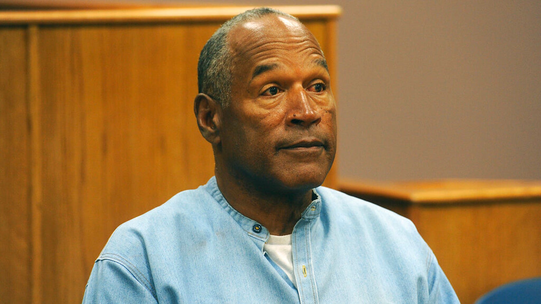 FILE: Former NFL footballer O.J. Simpson appears on video for his parole hearing at the Lovelock Correctional Center in Lovelock, Nev. 