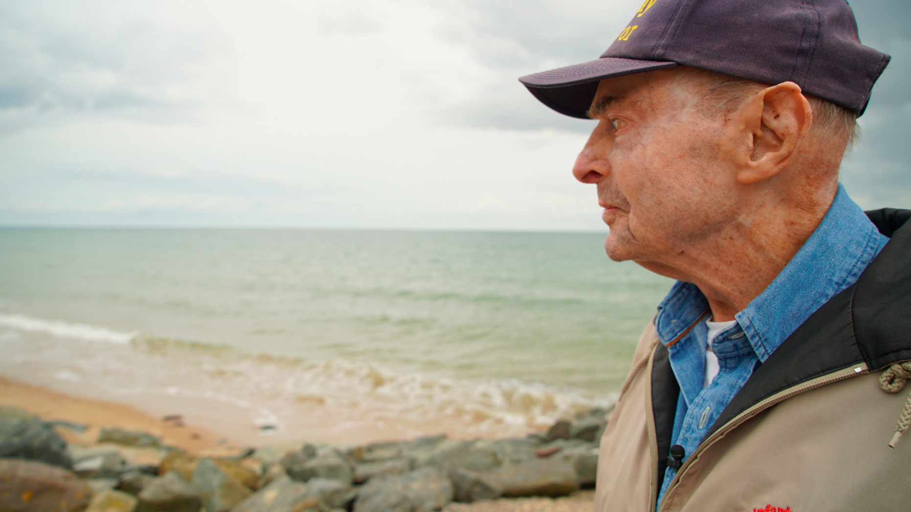 D-Day survivor Ray Lambert looks out over Omaha Beach in Colleville-sur-Mer, France, on Wednesday, June 5, 2019. The North Carolina man was wounded four times on the beach during the Normandy invasion 75 years ago. (AP Photo/Allen G. Breed)