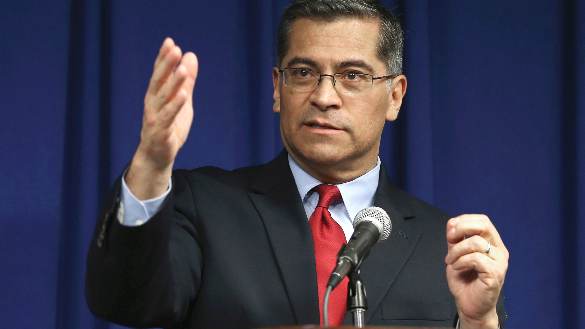 ADDS FIRST NAME OF MAN CHARGED - FILE - In this March 5, 2019 file photo, California Attorney General Xavier Becerra speaks during a news conference in Sacramento, Calif. Becerra announced on Tuesday, June 4, 2019 that California authorities charged Naasón Joaquín García, the leader and self-proclaimed apostle of La Luz del Mundo, a Mexico-based church with branches in the U.S. claiming more than 1 million followers, with child rape, human trafficking and producing child pornography in Southern California. (AP Photo/Rich Pedroncelli, File)
