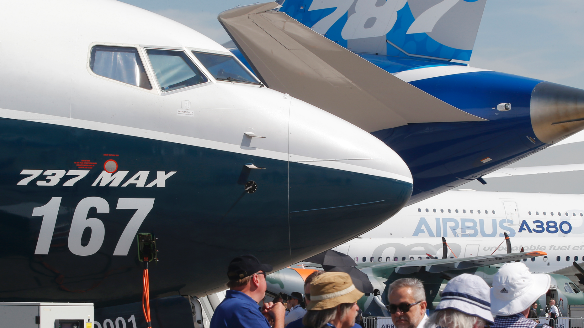 DOSSIER - In this June 20, 2017, photo of Boeing aircraft archives exhibited at the Paris Air Show, Le Bourget, east of Paris. The uncertainty on a Boeing aircraft and the apprehension of the global economy hover over the aviation industry as it prepares for the Paris Air Show next week. (AP Photo / Michel Euler, File)