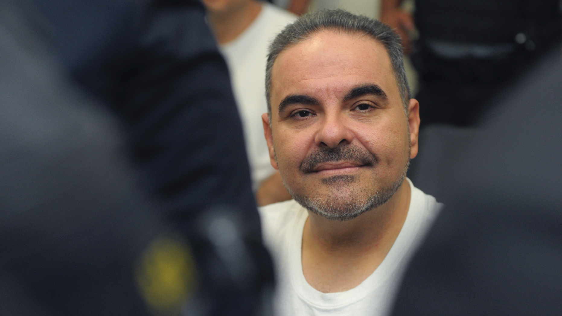 FILE - In this Aug. 8, 2018 file photo, El Salvador's former President Tony Saca attends an hearing with a judge at the Isidro Menendez Judicial Complex in San Salvador, El Salvador, regarding charges of embezzling hundreds of millions of dollars in government funds in return for a lighter sentence. Saca will undergo an abbreviated process and confess before a judge that he bribed a judicial employee to leak information in a civil suit against him, according to El Salvador's Public Prosecutor's Office on Wednesday, June 5, 2019. (AP Photo/Salvador Melendez, File)