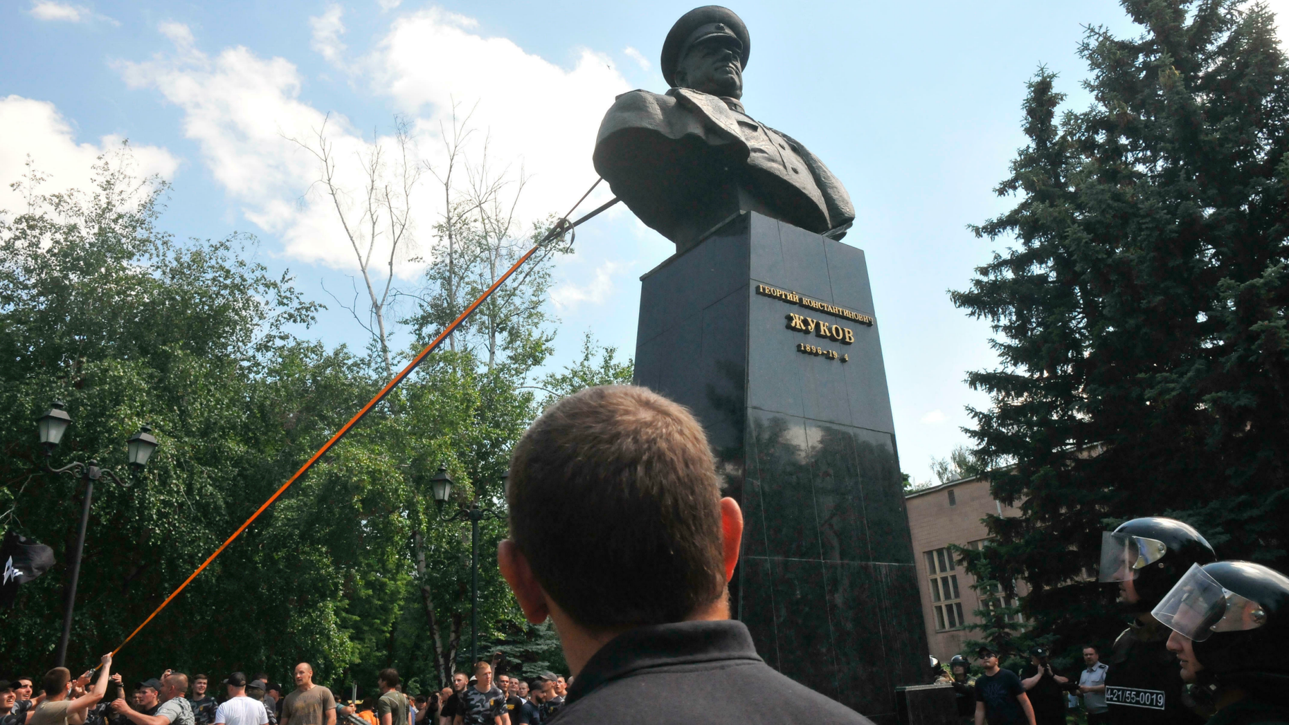 Activists tear down a monument of Soviet Chief Marshal Georgiy Zhukov in Kharkiv, Ukraine, Sunday, June 2, 2019. The activists broke the monument to pieces as one of the last symbols of the Soviet era. (AP Photo/str)