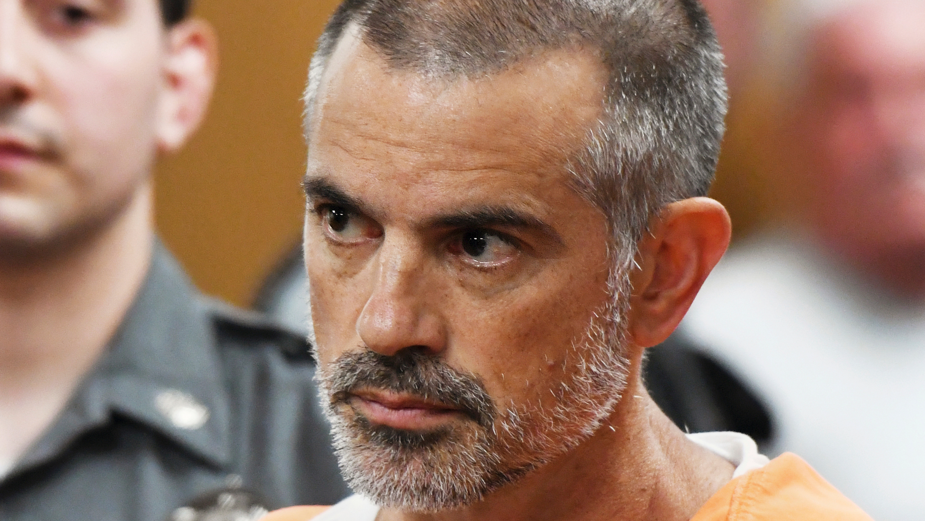 Fotis Dulos is arraigned on charges of tampering with or fabricating physical evidence and first-degree hindering prosecution at Norwalk Superior Court in Norwalk, Conn. Monday, June 3, 2019. Fotis Dulos, and his girlfriend, Michelle C. Troconis, were arrested at an Avon hotel late Saturday night and held on a $500,000 bond for charges of tampering with or fabricating physical evidence and first-degree hindering prosecution. Fotis Dulos is the estranged husband of Jennifer Dulos, the 50-year-old mother of five who has been missing since May 24. (Tyler Sizemore/Hearst Connecticut Media via AP, Pool)