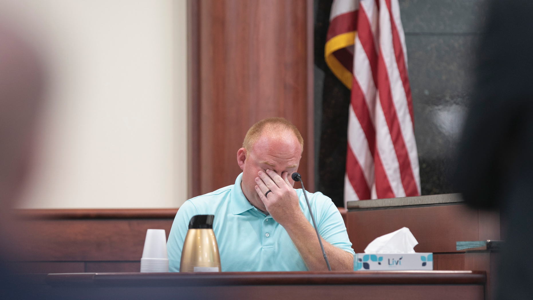 Jonathan Stone, Nahtahn Jones's kindergarten teacher, wipes his eyes while talking about Nahtahn Jones during the sentencing phase of the trial of Tim Jones in Lexington, S.C. on Friday, June 7, 2019. Jones, was found guilty of killing his 5 young children in 2014. (Tracy Glantz/The State via AP, Pool)