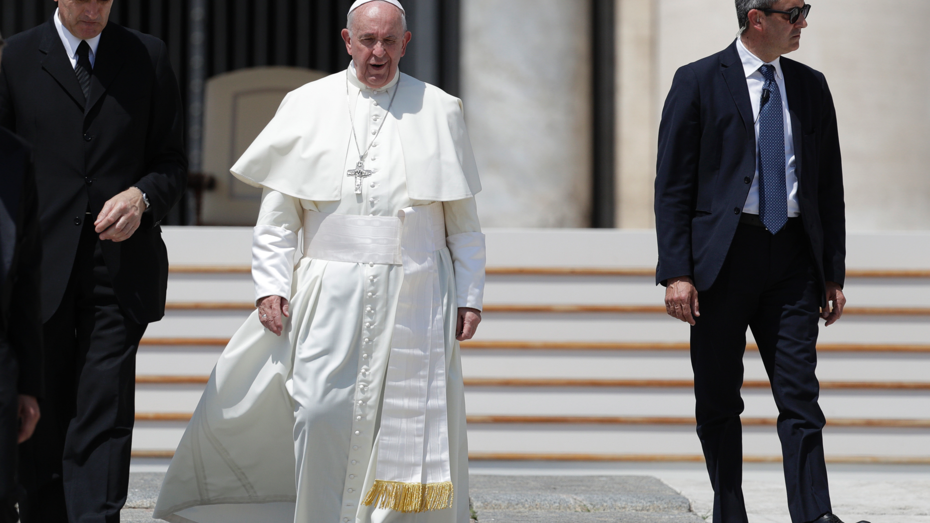Pope Francis leaves at the end of his weekly general audience in St. Peter square at the Vatican, Wednesday, June 5, 2019. At left is Francis' butler Sandro Mariotti. (AP Photo/Andrew Medichini)