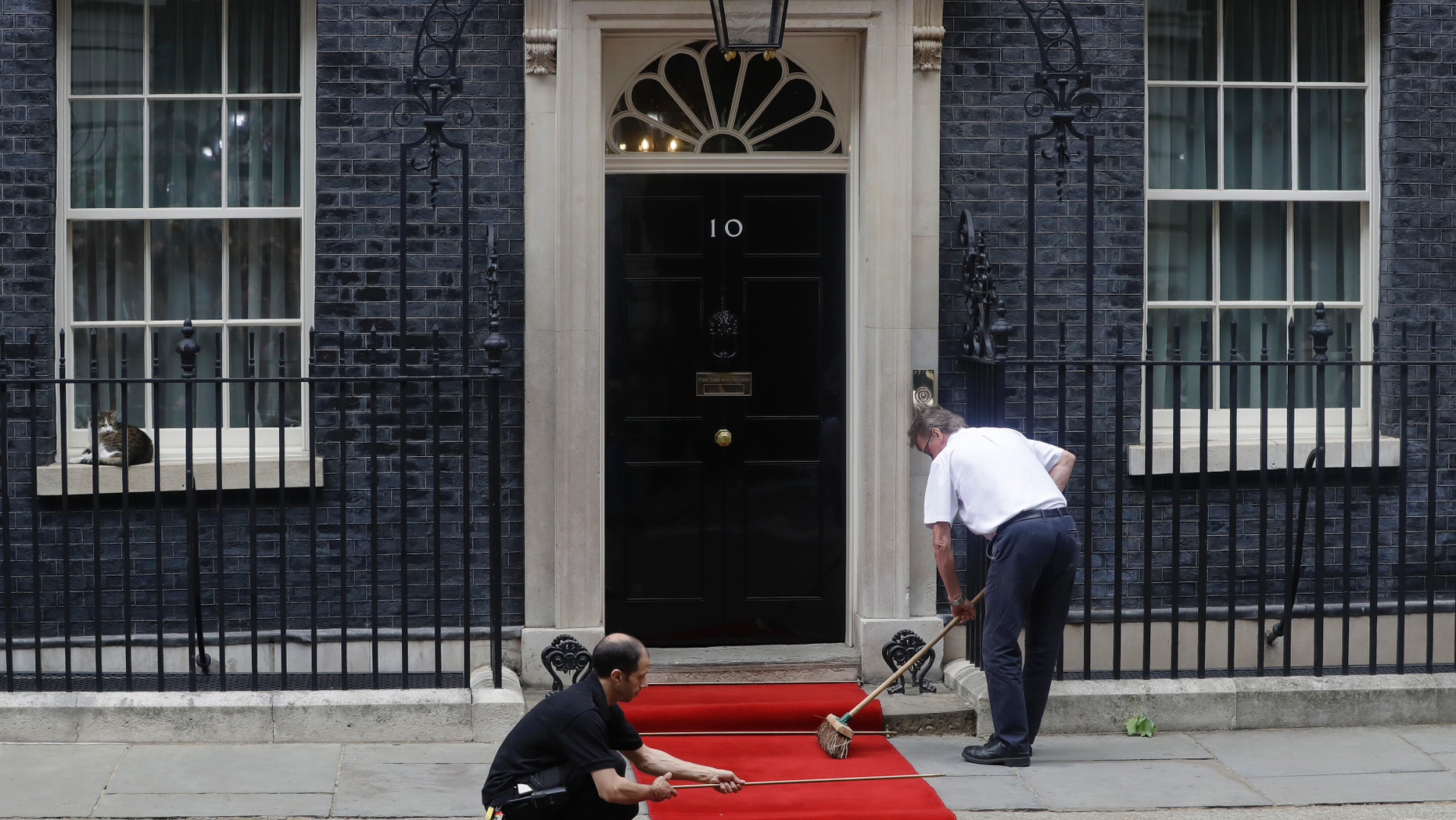 FILE - In this June 4, 2019 file photo, the red carpet is rolled out outside 10 Downing Streets before the arrival of President Donald Trump in central London. Britain’s Conservative Party is holding a contest to replace Prime Minister Theresa May, who stepped down from the party helm last week after failing to deliver Brexit. The contenders have until Monday, June 10, 2019, to submit nomination papers. (AP Photo/Kirsty Wigglesworth, File)