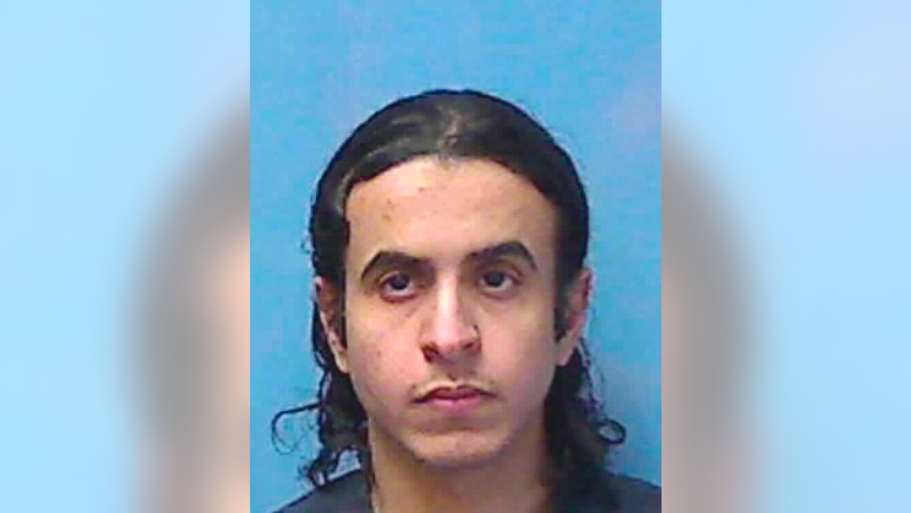 This undated photo provided by the Nevada Department of Corrections shows Mazen Alotaibi, 30, of Saudi Arabia. A Nevada judge is being asked for a sentencing do-over for Alotaibi, a former Saudi Arabian air force sergeant serving 35 years in prison for kidnapping and sexually assaulting a 13-year-old boy at a Las Vegas Strip hotel on New Year's Eve 2012. (Nevada Department of Corrections via AP)