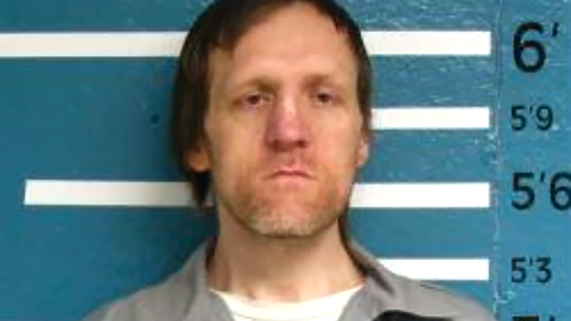 This Feb. 25, 2018 booking photo provided by the Missouri Department of Corrections shows Edward Terry. Terry is accused of threatening to shoot and kill "every gay person" and himself at the city's Pride parade. The St. Louis Post-Dispatch reports that Terry was charged Tuesday, June 18, 2019, with making a terrorist threat. (Missouri Department of Corrections via AP)