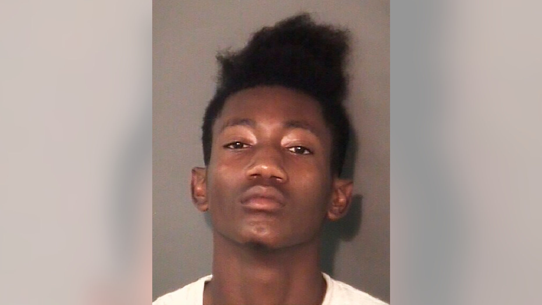 This undated photo provided by the Sheriff's Office of Orange County, North America, shows Jataveon Dashawn Hall. The alleged burglar with a machete was arrested nearly two days after leaving the hospital where he was being treated. (Orange County Sheriff's Office via AP)