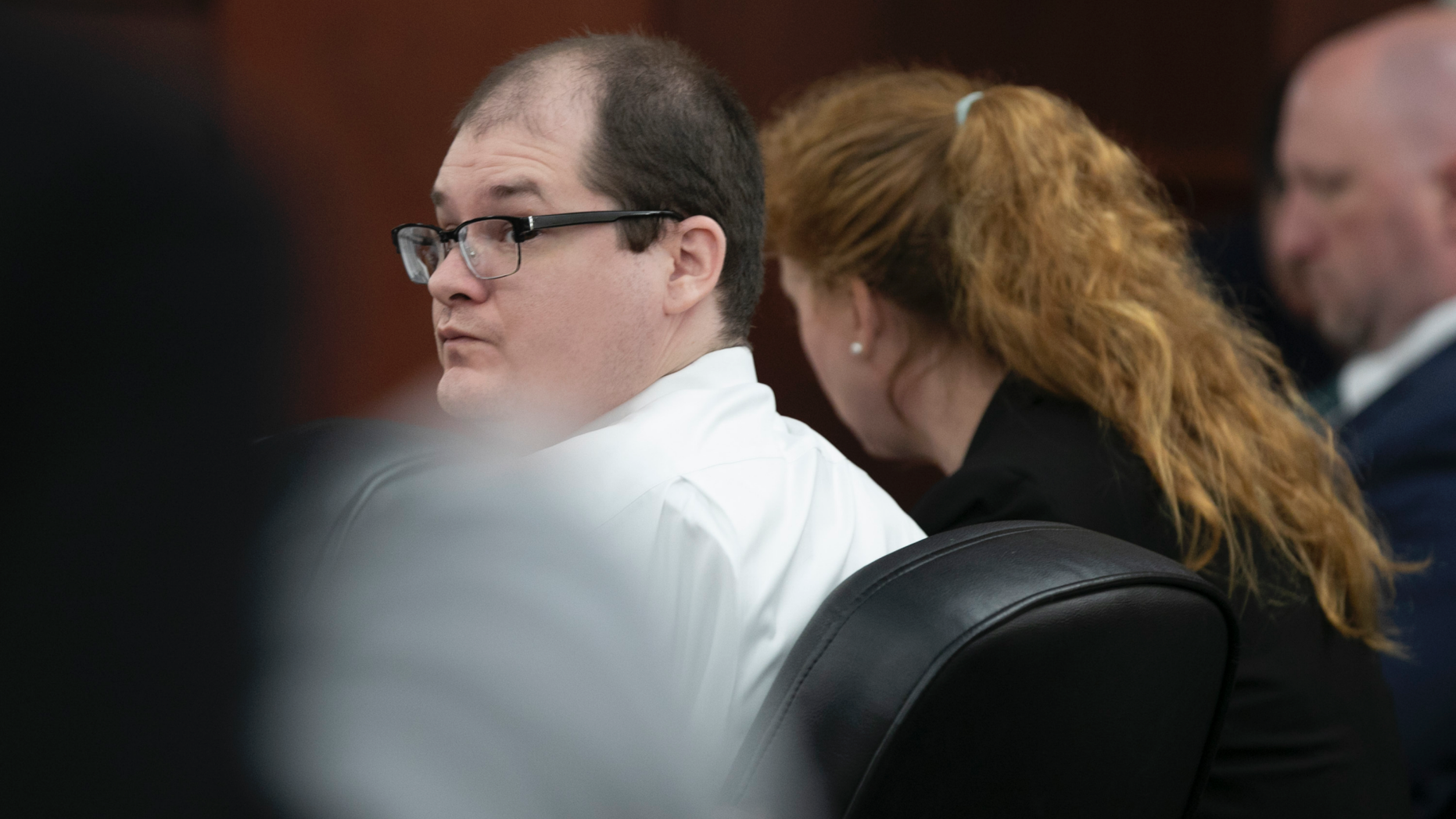 Timothy Jones Jr. looks around the courtroom during closing arguments of his trial in Lexington, S.C. on Thursday, June 13, 2019. Jones, Jr. was found guilty of killing his five young children in 2014. (Tracy Glantz/The State via AP, Pool)/