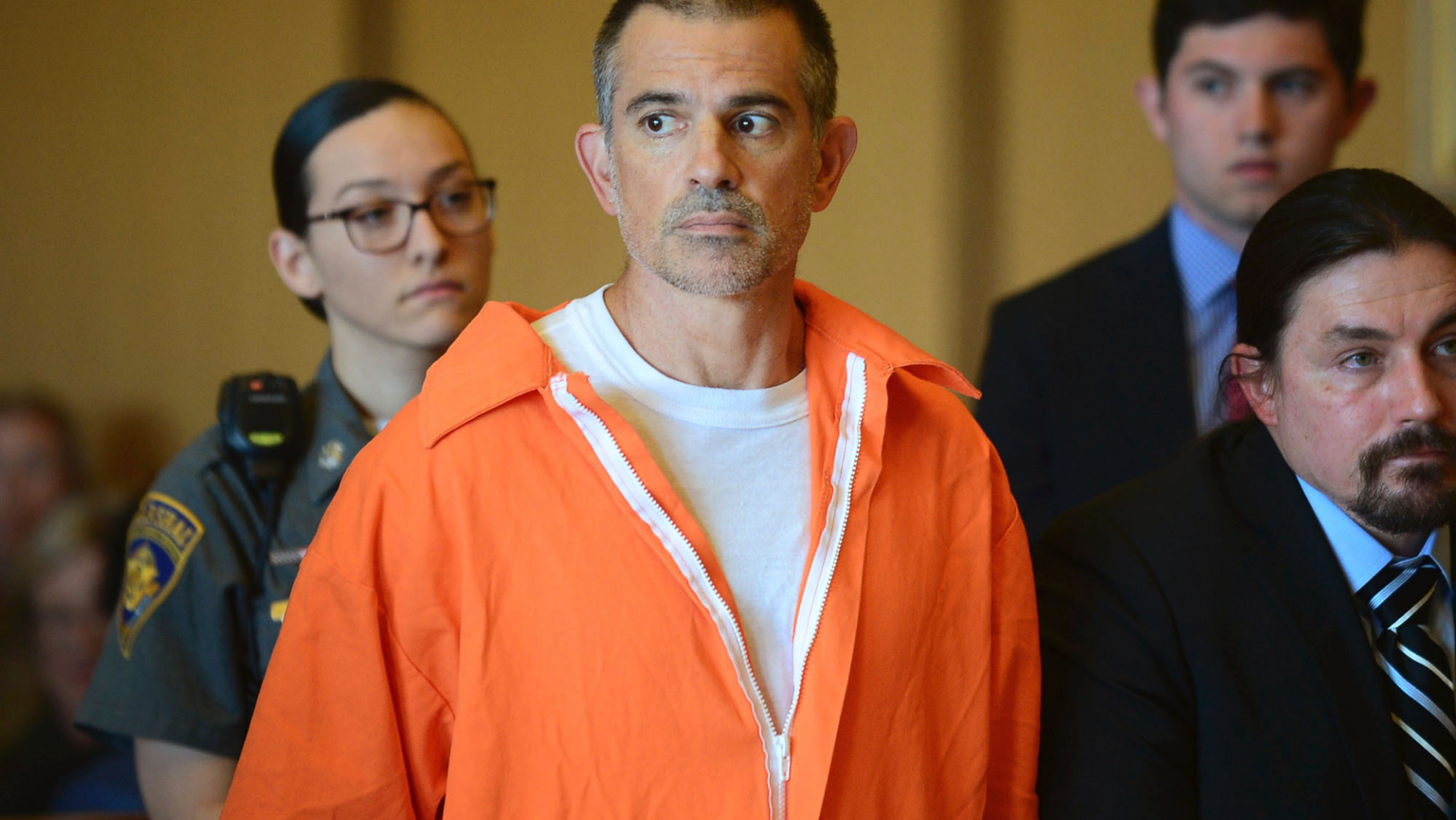 Fotis Dulos stands during a hearing at Stamford Superior Court, Tuesday, June 11, 2019 in Stamford, Conn. Fotis Dulos, and his girlfriend, Michelle Troconis, have been charged with evidence tampering and hindering prosecution in the disappearance of his wife Jennifer Dulos. The mother of five has has been missing since May 24. (Erik Trautmann/Hearst Connecticut Media via AP, Pool)