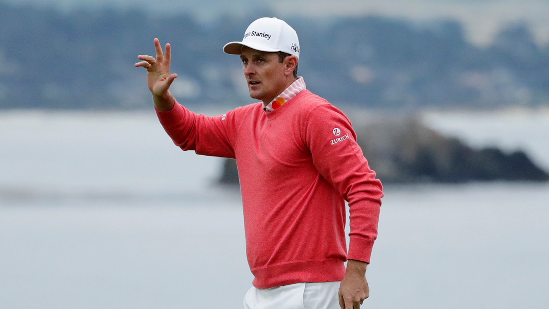 Justin Rose, of England, waves after his first round of the U.S. Open Championship golf tournament Thursday, June 13, 2019, in Pebble Beach, Calif. (AP Photo/Matt York)
