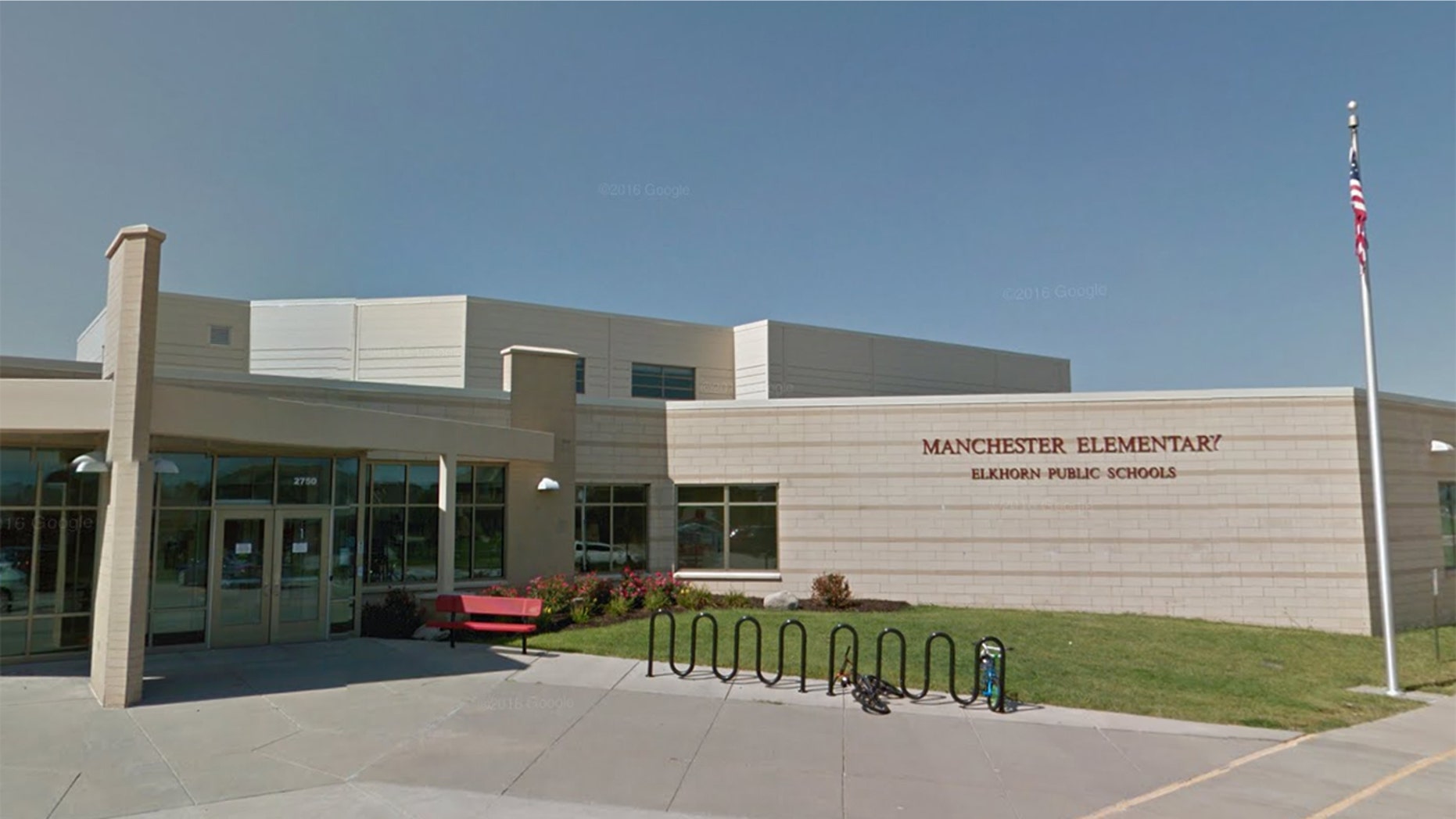 Manchester Elementary School in Omaha, Neb. scrubbed inspirational words from its yearbook cover shaped like a cross after someone expressed outrage.