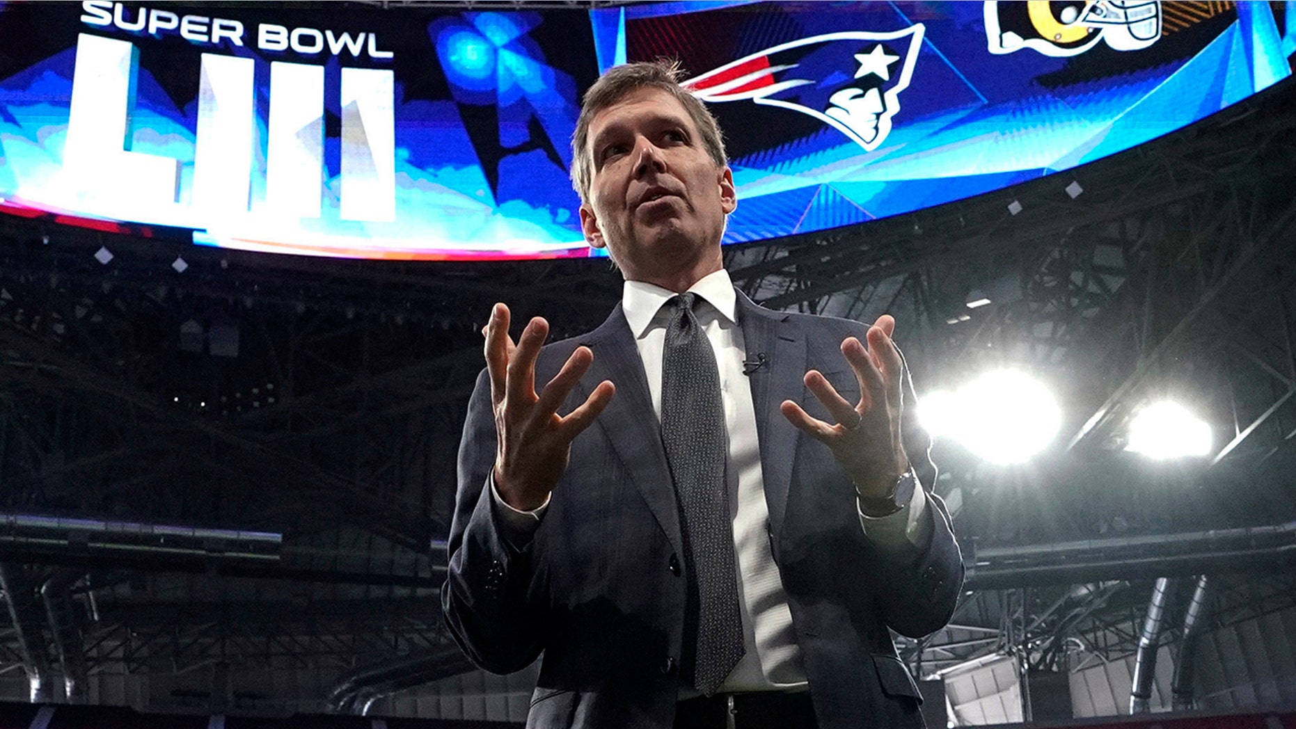 FILE - In this Jan. 29, 2019, file photo, NFL Chief Medical Officer Dr. Allen Sills gestures while speaking during a health and safety tour at Mercedes-Benz Stadium for the NFL Super Bowl 53 football game in Atlanta. The NFL's top medical experts are asking college football physicians and trainers to help make the game safer. Dr. Allen Sills and Jeff Miller, the NFL's executive vice president for health and safety initiatives, spent Monday June 17 2019 and Tuesday, June 18, 2019 in Indianapolis sharing data about their findings on the prevention and treatment of injuries. (AP Photo/David J. Phillip, File)