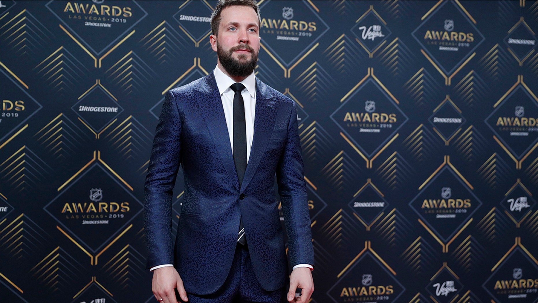 Tampa Bay Lightning's Nikita Kucherov poses on the red carpet before the NHL Awards, Wednesday, June 19, 2019, in Las Vegas. (AP Photo/John Locher)