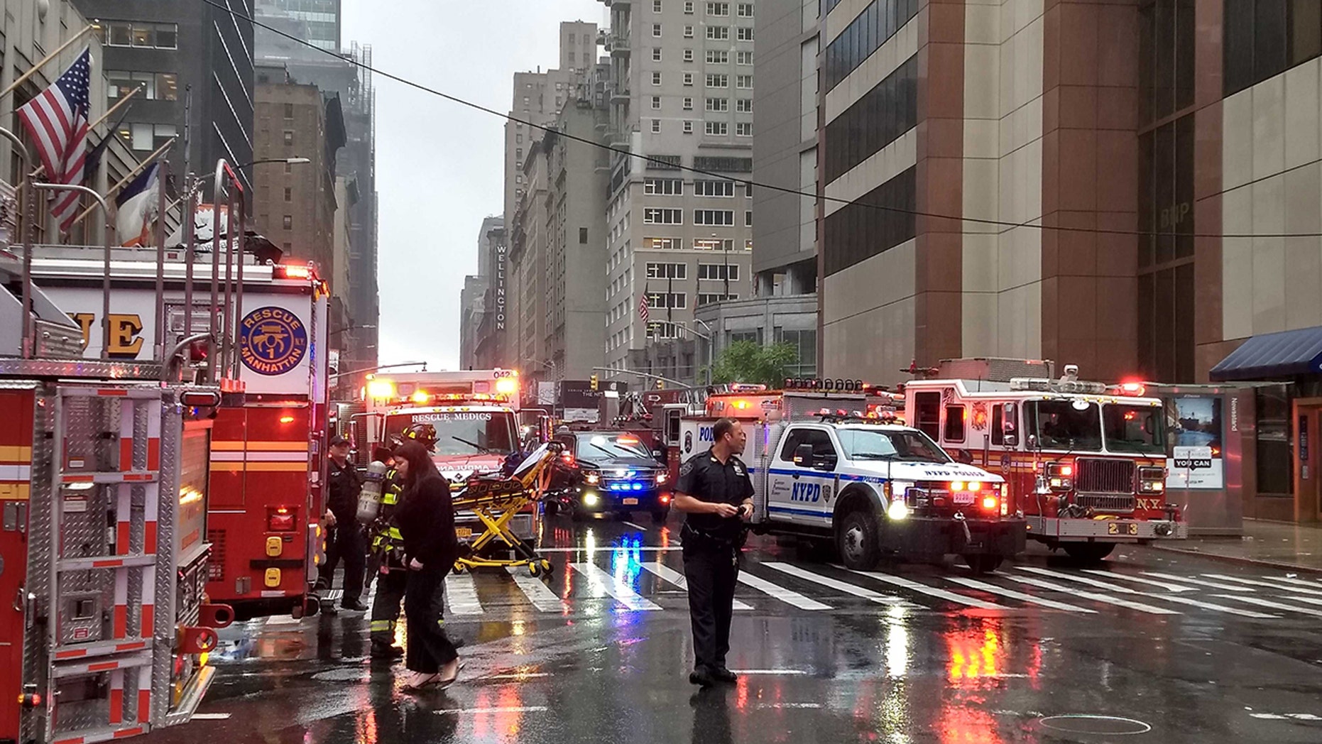 Helicopter crashes into highrise building in New York City, fire