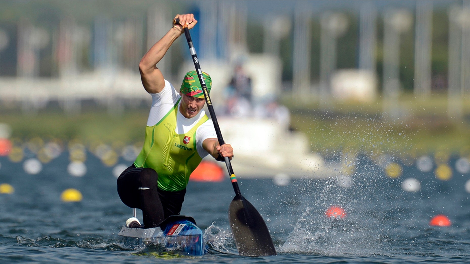 Olympic silver medalist Jevgenij Shuklin has been disqualified from the 2012 London Olympics for doping with an anabolic steroid. The IOC has yet to reallocate medals. (AP Photo/Philip Brown, Pool, File)