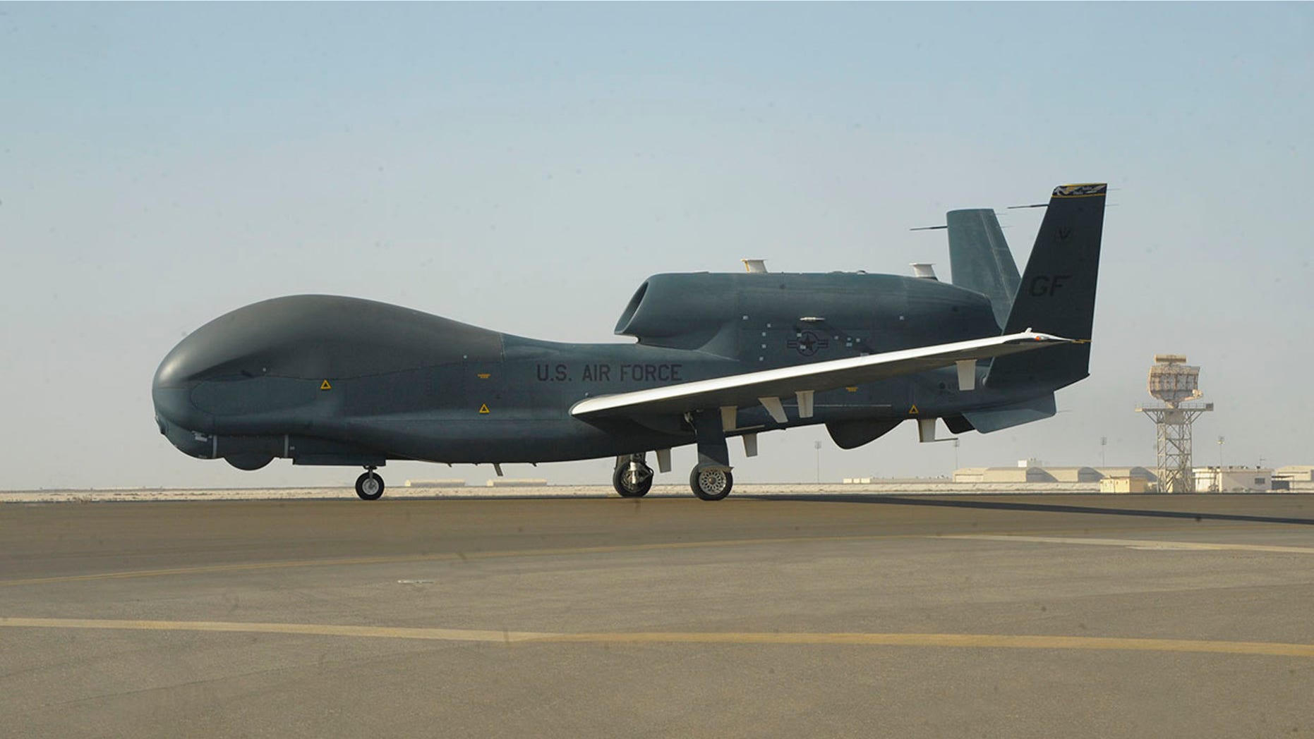 Photo released by the U.S. Air Force, an RQ-4 Global Hawk is seen on the tarmac of Al-Dhafra Air Base near Abu Dhabi, United Arab Emirates. (Airman 1st Class D. Blake Browning/U.S. Air Force via AP)