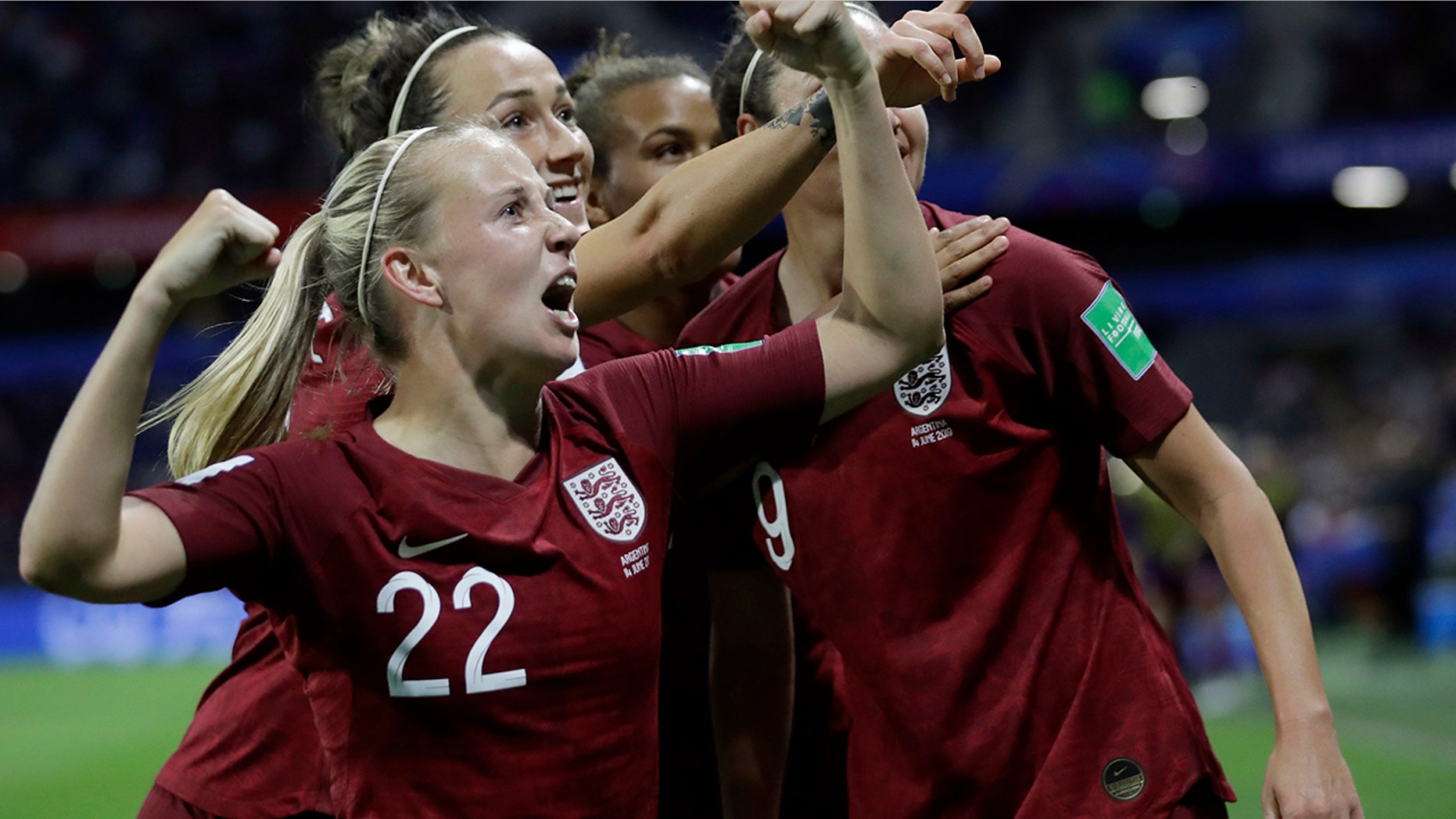 England's Beth Mead, front, celebrates after her teammate Jodie Taylor scored the opening goal during the Women's World Cup Group D soccer match between England and Argentina at the Stade Oceane in Le Havre, France, Friday, June 14, 2019. (AP Photo/Alessandra Tarantino)