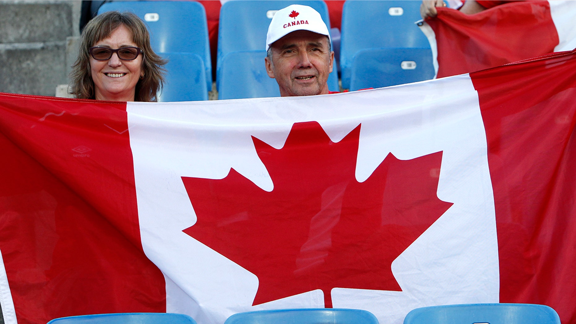 Canadian fans wait for the start of the Women's World Cup Group E soccer match between Canada and Cameroon in Montpellier, France, Monday, June 10, 2019. (AP Photo/Claude Paris)