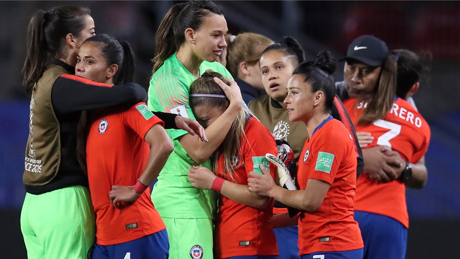 Chile players react at the end of the Women's World Cup Group F soccer match between Thailand and Chile at the Roazhon Park in Rennes, France, Thursday, June 20, 2019. Chile won 2-0, one goal short of the win by three goals difference needed to qualify for the next round. (AP Photo/David Vincent)