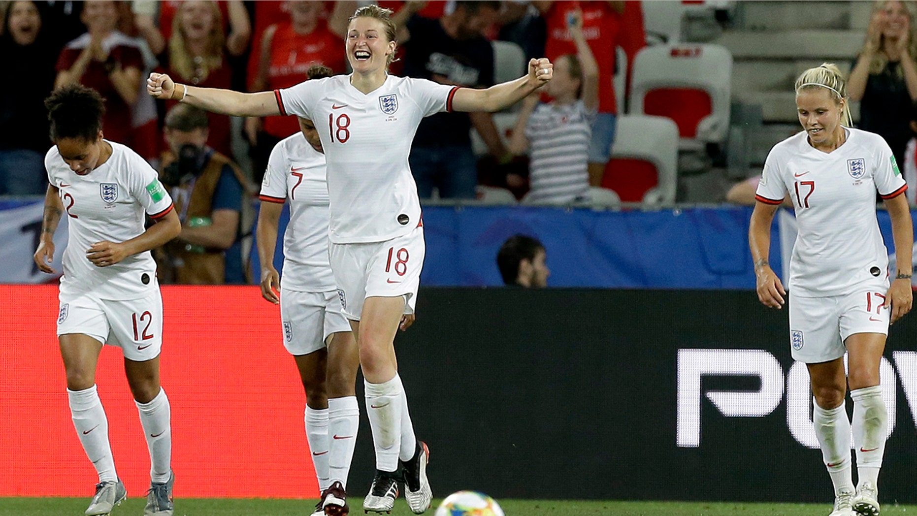 England's Ellen White, front, celebrates after scoring her side's second goal during the Women's World Cup Group D soccer match between Japan and England at the Stade de Nice in Nice, France, Wednesday, June 19, 2019. (AP Photo/Claude Paris)