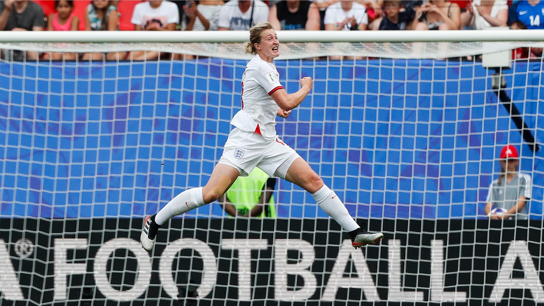 England's Ellen White celebrates after scoring her side's 2nd goal during the Women's World Cup round of 16 soccer match between England and Cameroon at the Stade du Hainaut stadium in Valenciennes, France, Sunday, June 23, 2019. (AP Photo/Michel Spingler)