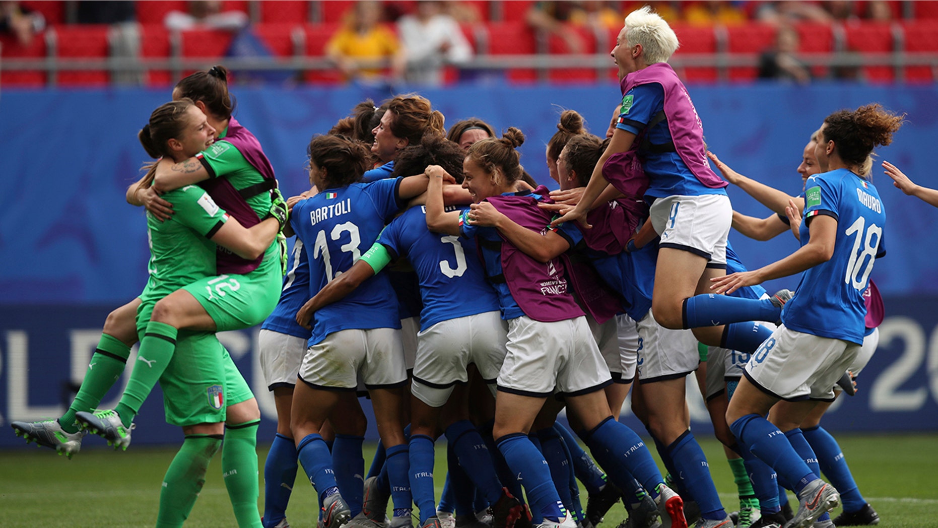 Players of Italy celebrate after winning the Women's World Cup Group C soccer match between Australia and Italy at the Stade du Hainaut in Valenciennes, Sunday, June 9, 2019. (AP Photo/Francisco Seco)