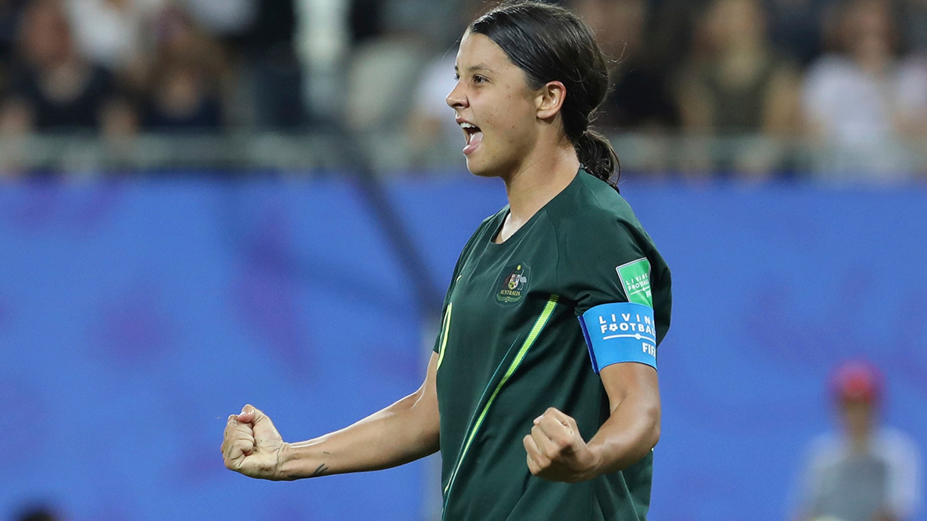 Australia's Sam Kerr celebrates after scoring her side's fourth goal during the Women's World Cup Group C soccer match between Jamaica and Australia at Stade des Alpes stadium in Grenoble, France, Tuesday, June 18, 2019. (AP Photo/Laurent Cipriani)