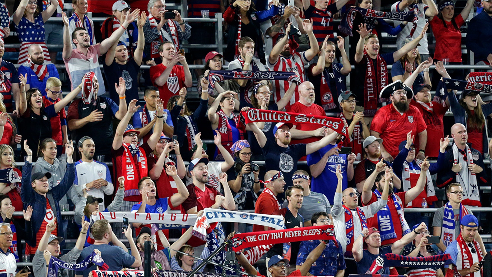 U.S. fans cheer during the second half of the team's CONCACAF Gold Cup soccer match against Guyana on Tuesday, June 18, 2019, in St. Paul, Minn. (AP Photo/Andy Clayton-King)