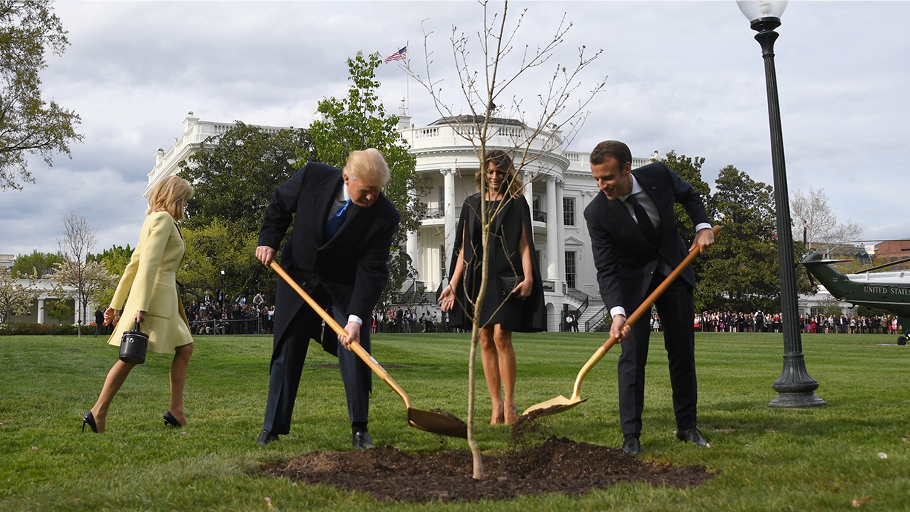 President Trump and first lady Melania Trump participate in a tree planting ceremony with French President Emmanuel Macron and his wife Brigitte Macron on the South Lawn of the White House in Washington, DC, on April 23, 2018. (JIM WATSON/AFP/Getty Images)