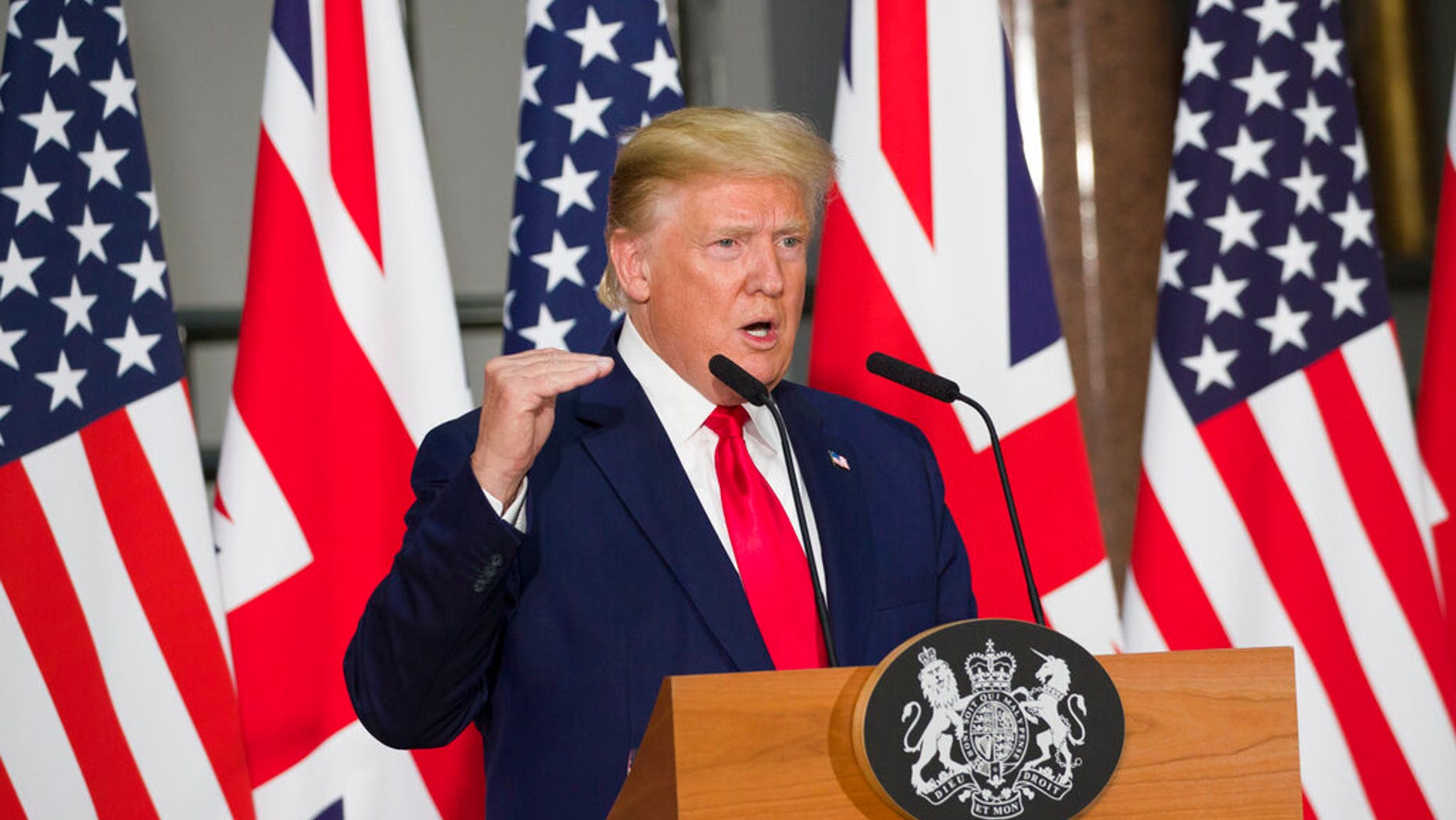 President Donald Trump speaks during a news conference with British Prime Minister Theresa May at the Foreign Office, Tuesday, June 4, 2019, in central London. (AP Photo/Alex Brandon)