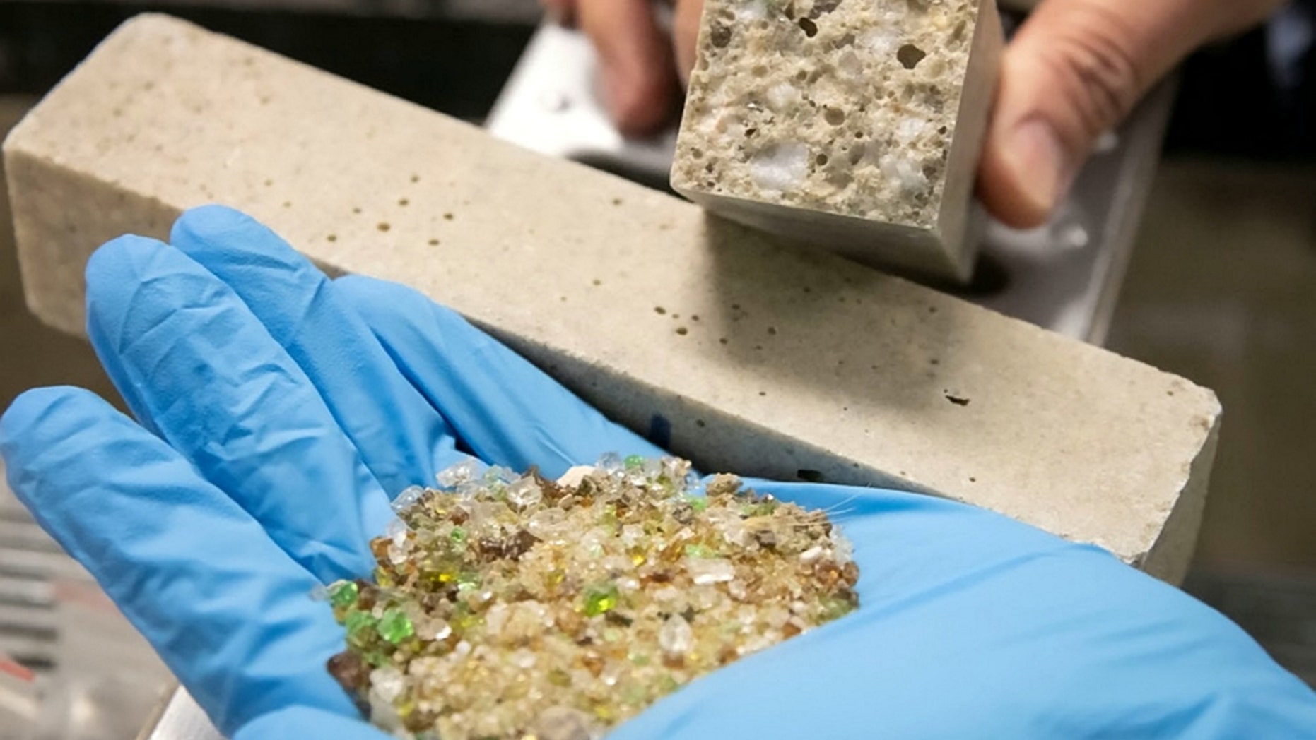 Australian researchers have discovered that old ground glass can be used to make polymer concrete, which can be used for roads and carparks. (Credit: SWNS)