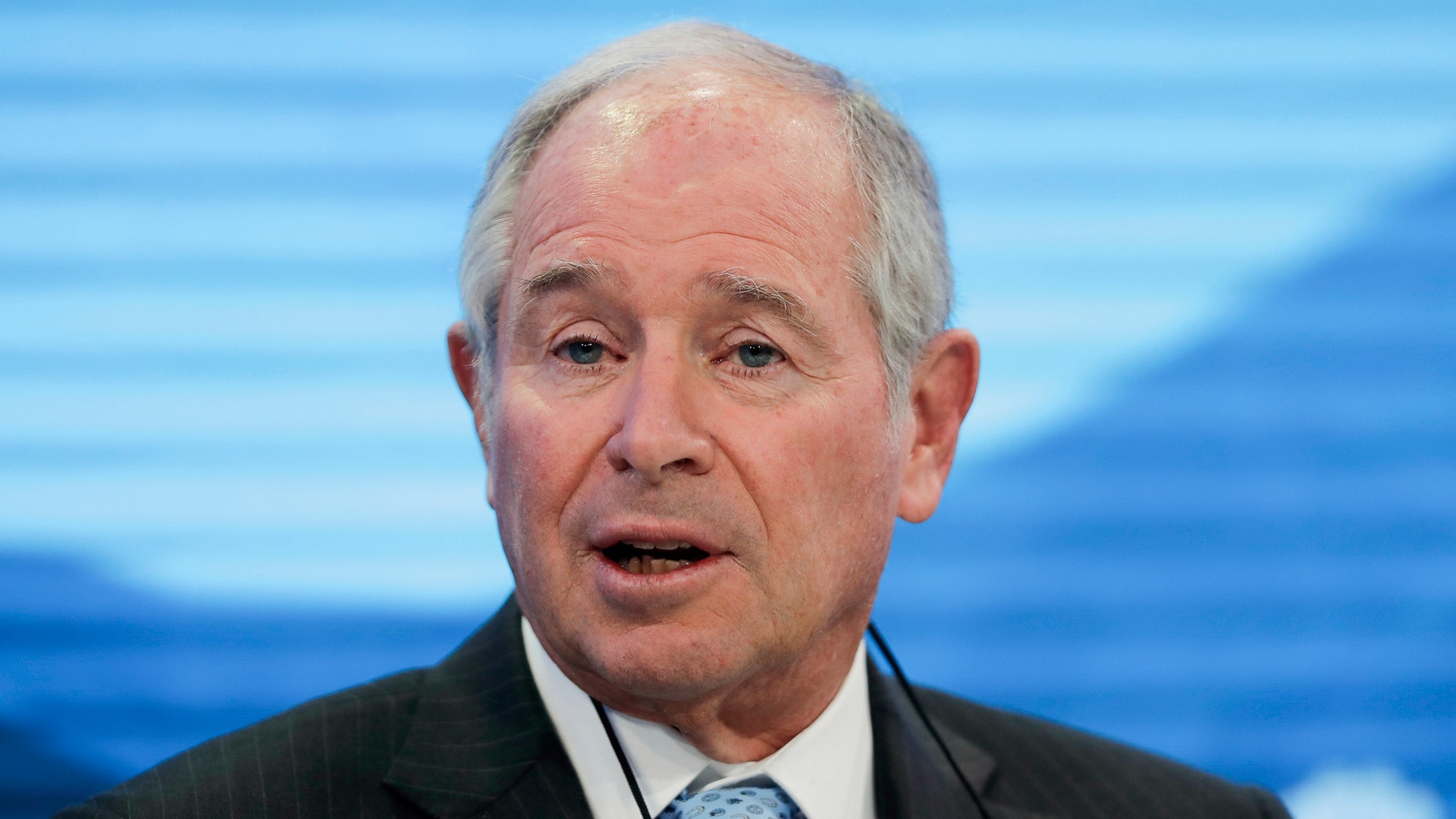FILE - In this Tuesday, Jan. 22, 2019 file photo, Stephen Schwarzman CEO of Blackstone attends the session 'Shaping a New Market Architecture' at the annual meeting of the World Economic Forum in Davos, Switzerland. An American billionaire has given Oxford University 150 million pounds ($188.6 million) for a new institute that will study the ethical implications of artificial intelligence and computing technologies. (AP Photo/Markus Schreiber, File)