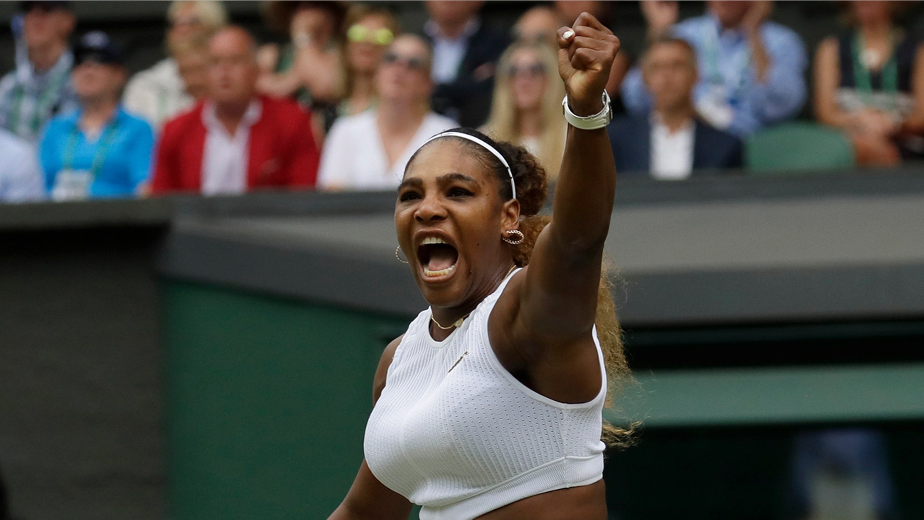 United States' Serena Williams celebrates after winning a point against United States' Alison Riske during a women's quarterfinal match on day eight of the Wimbledon Tennis Championships in London, Tuesday, July 9, 2019. (AP Photo/Kirsty Wigglesworth)