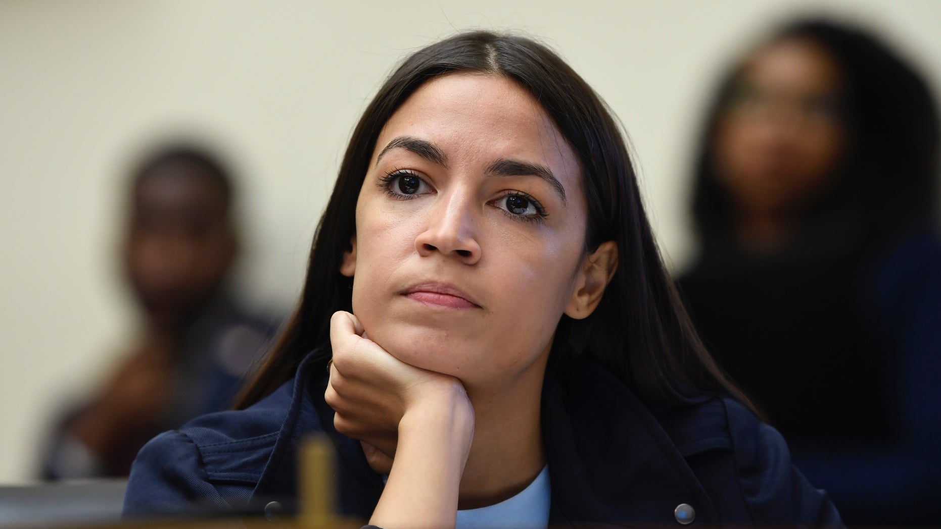Representative Alexandria Ocasio-Cortez, DN.Y., listened to the testimony of Federal Reserve Chairman Jerome Powell at the House Financial Services Committee on Capitol Hill in Washington on Wednesday, July 10, 2019. (AP Photo / Susan Walsh)