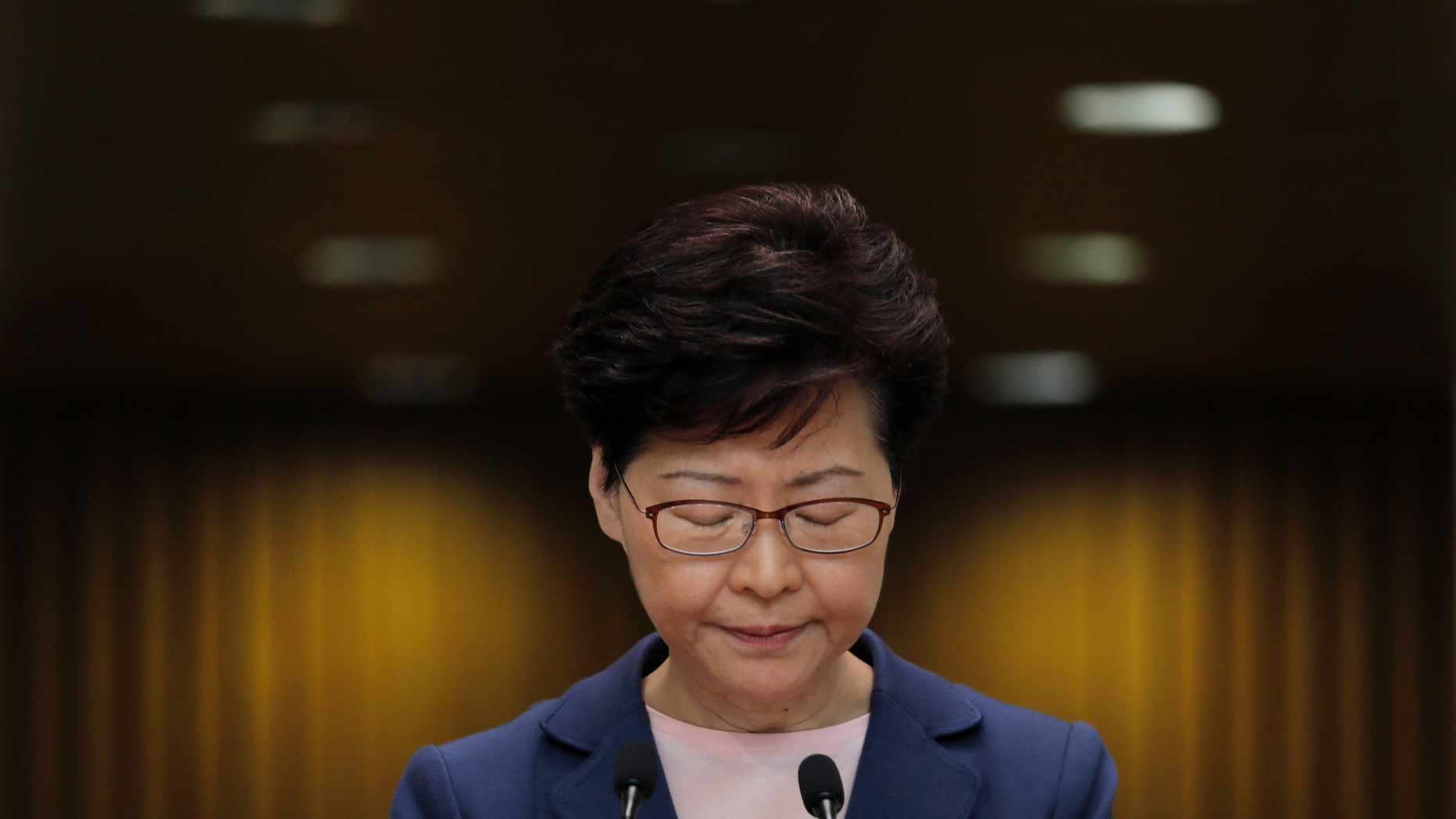 In this Tuesday, July 9, 2019, file photo, Hong Kong Chief Executive Carrie Lam pauses during a press conference in Hong Kong. (AP Photo/Vincent Yu, File)