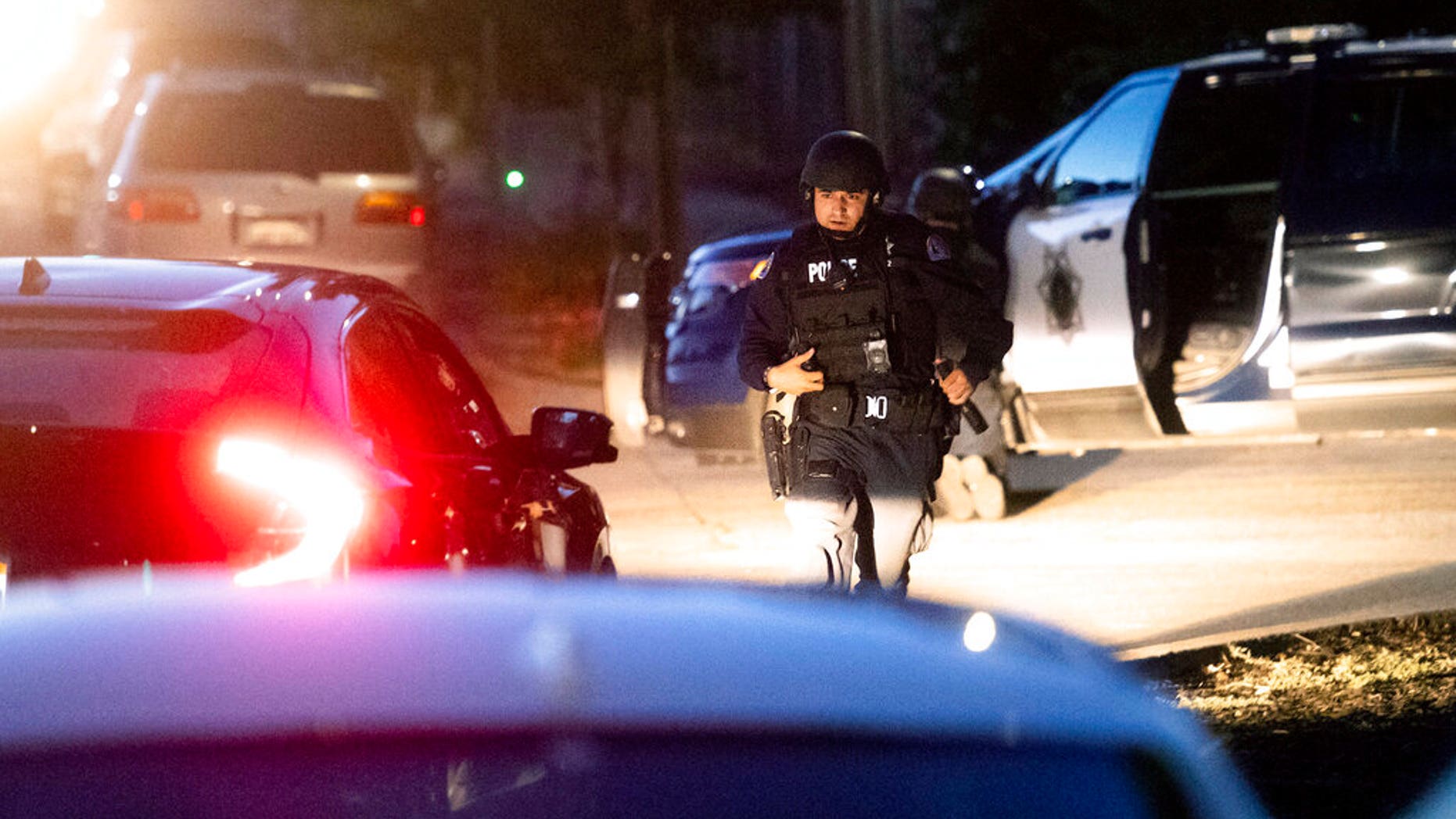Police work a scene after a deadly shooting at the Gilroy Garlic Festival in Gilroy, Calif., Sunday, July 28, 2019. (AP Photo/Noah Berger)